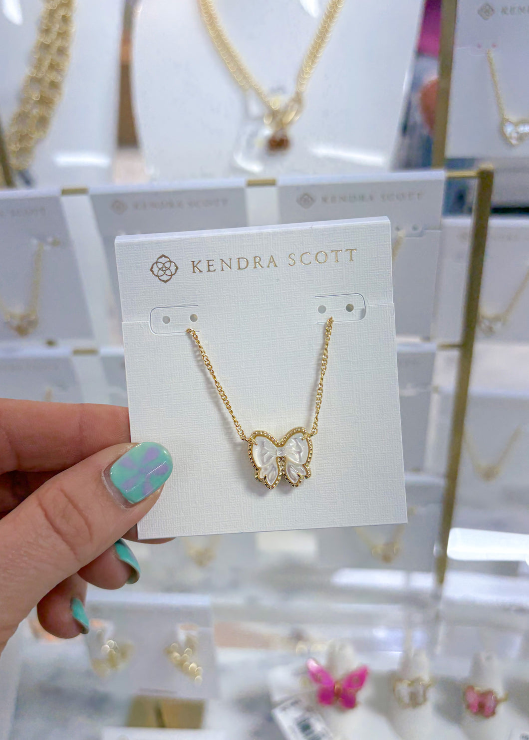 HALEY BOW SHORT PENDANT NECKLACE GOLD IVORY MOTHER OF PEARL